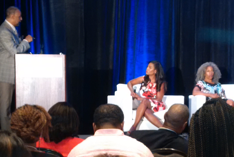 Ed Gordon and Omarosa Newman were publicly in conflict for about 33 minutes at the National Association of Black Journalists convention in New Orleans. Retired Los Angeles Police Sgt. Cheryl Dorsey is at right. (Richard Prince)